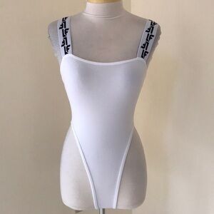 New! LF THE BRAND Size S white high cut bodysuit